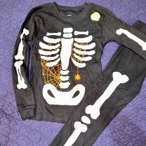 Carter’s glow-in-the-dark skeleton pajamas size 7